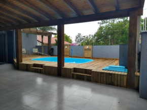 Casa confortável com piscina aquecida